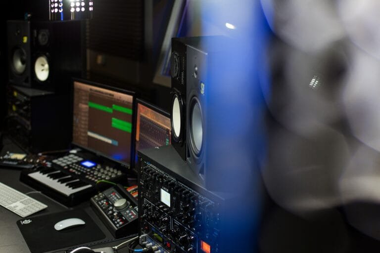 Music recording studio closeup with blue and red lights, details