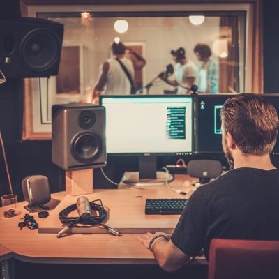 Music band during cd recording in studio