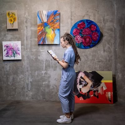 Young woman working in art gallery